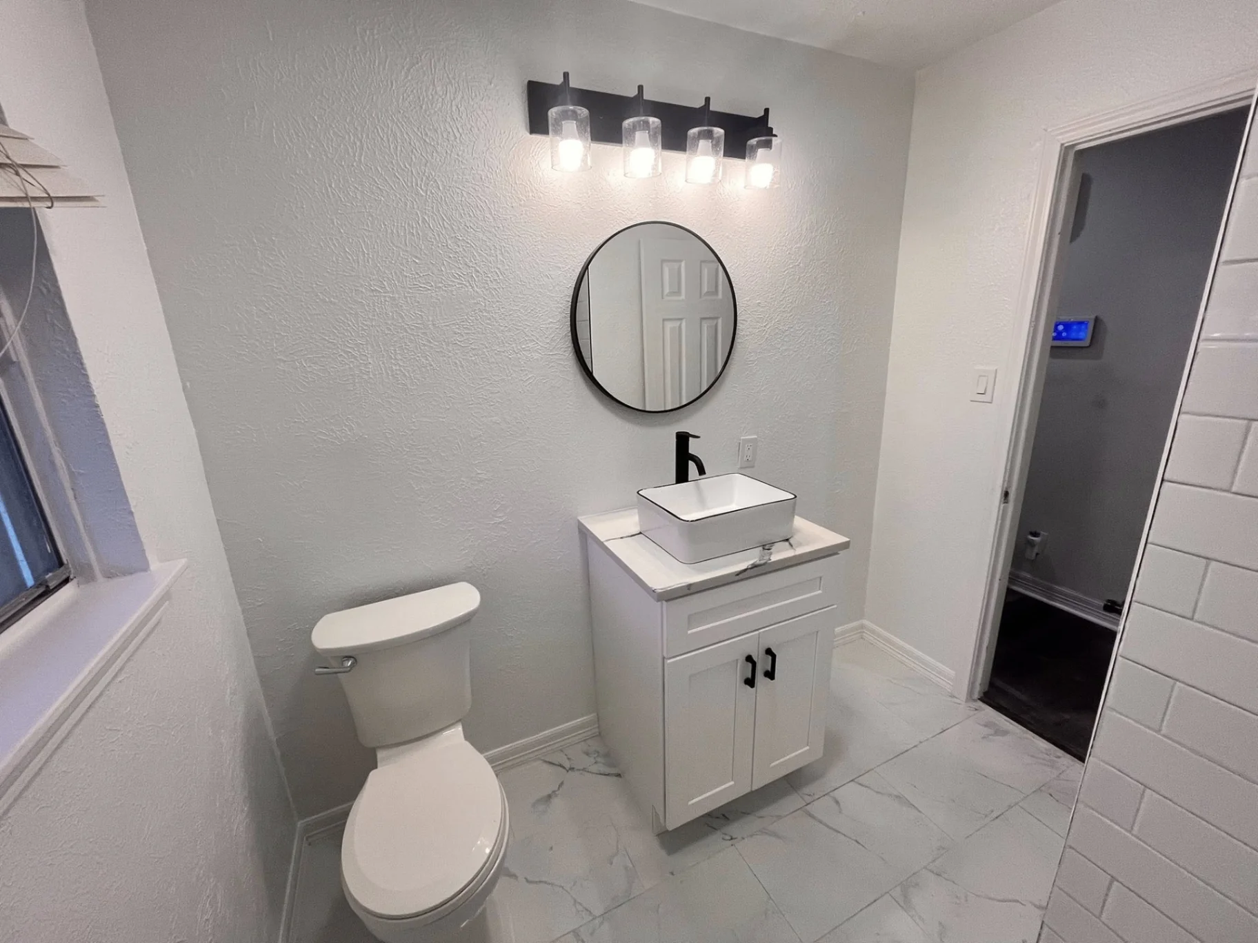 Custom bathroom remodel with modern tile in Houston TX