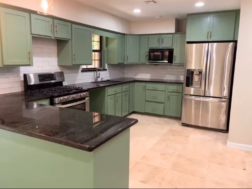 Kitchen remodeling project with green cabinets in Houston TX