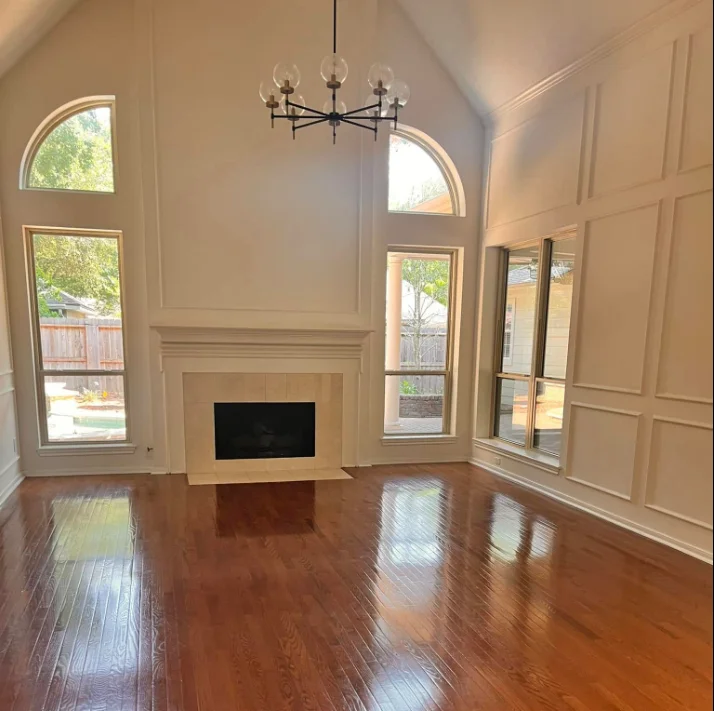 Living room renovation with new flooring and fresh paint