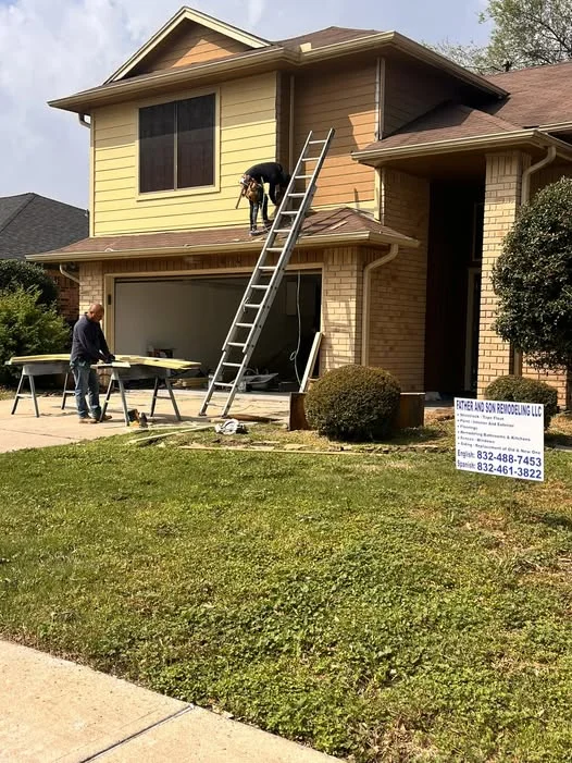 Father And Son Remodeling team working on a Houston home